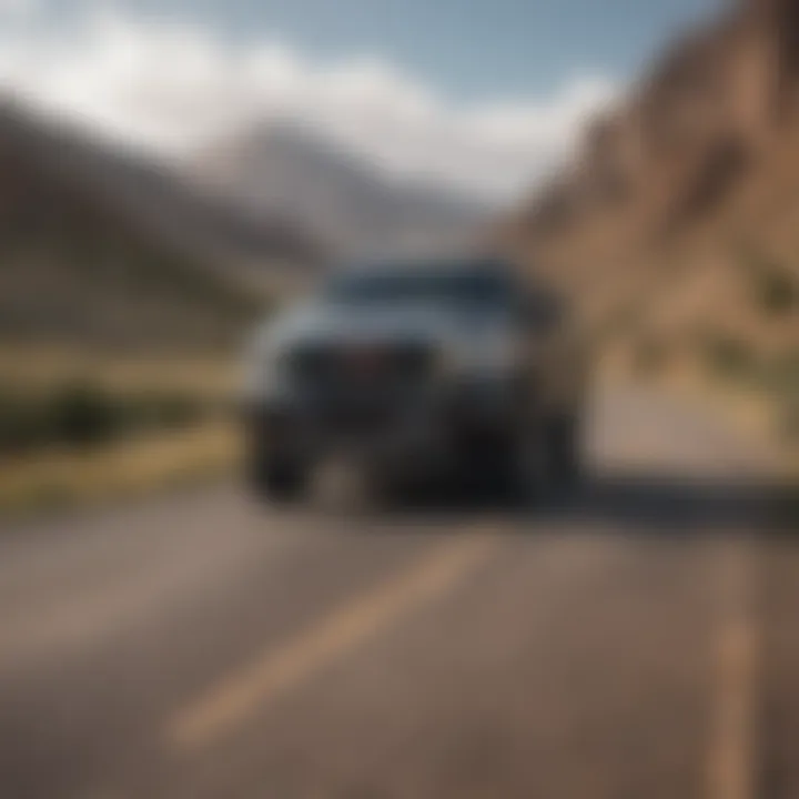 Sleek GMC vehicle navigating through scenic Colorado landscapes