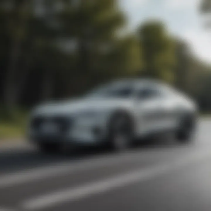 Dynamic driving scene featuring the Audi e-tron Fastback on a winding road