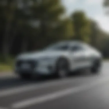 Exhilarating Performance of the Audi e-tron Fastback Dynamic driving scene featuring the Audi e-tron Fastback on a winding road