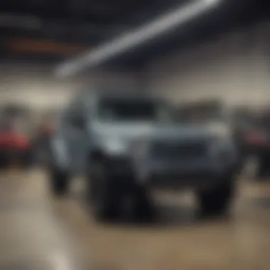 Service area at Bradshaw Jeep with technicians working on vehicles