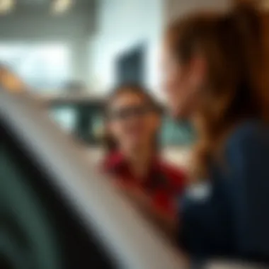 Customer service representatives assisting a client with vehicle options