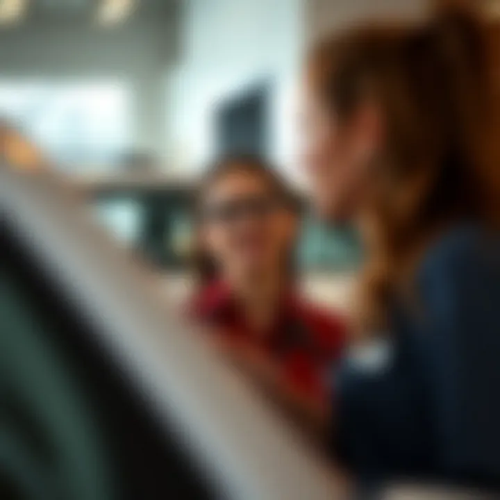 Customer service representatives assisting a client with vehicle options