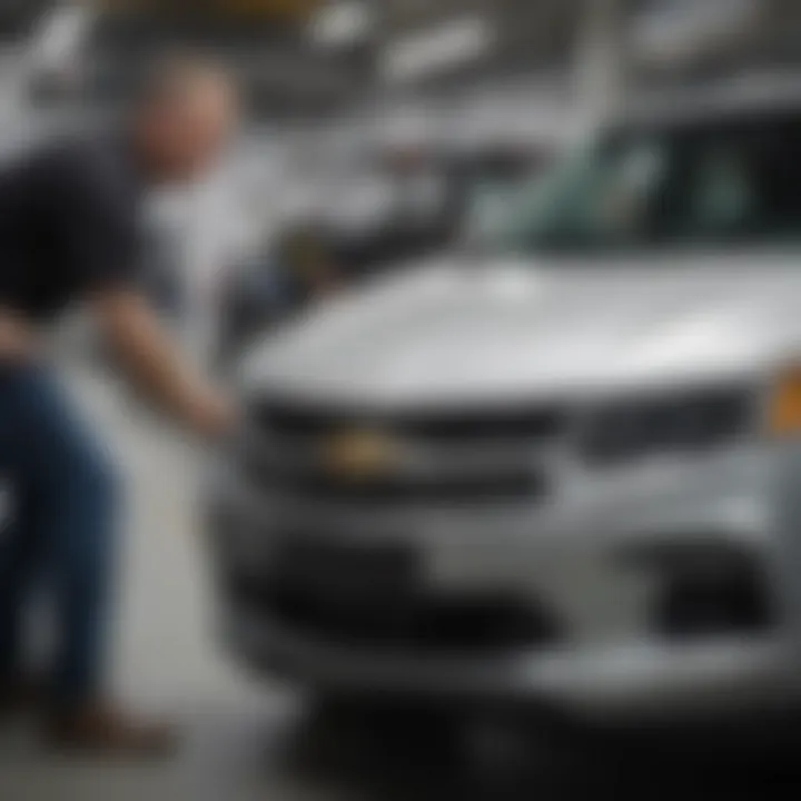 Expert technicians servicing a Chevrolet car at Autonation Chevrolet Doral Miami