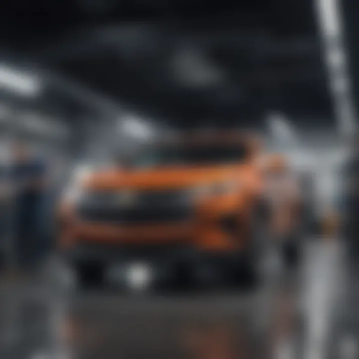 Service technicians working on Chevrolet vehicles in the dealership workshop