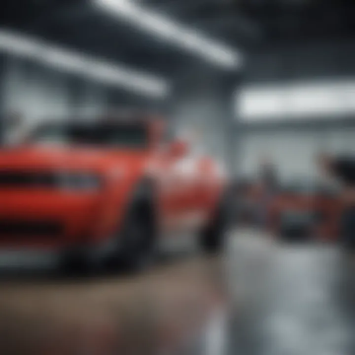 Mechanics working on vehicles in the service department of the dealership