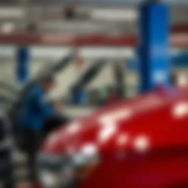 Service Area at GM Dealership Mechanic working on a GM vehicle in the service area