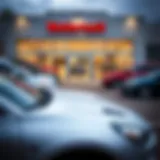 Exterior view of a Neenah car dealership showcasing a variety of vehicles