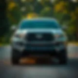 Front view of the new Toyota Tacoma showcasing its bold grille and sleek lines