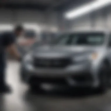 Skilled technician performing maintenance on a Honda vehicle