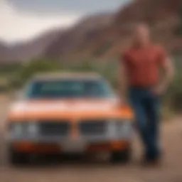 Karl Malone posing with a classic Dodge muscle car