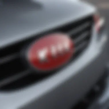 Close-up of a new Kia emblem