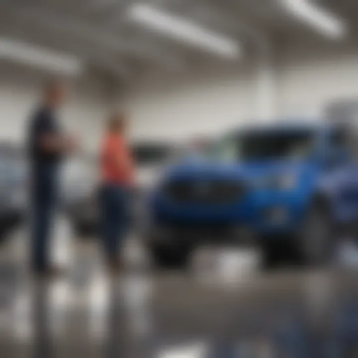 Customer interacting with a knowledgeable sales associate at Larry Roesch Ford