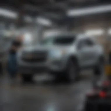 Expert technicians working on Chevrolet vehicle