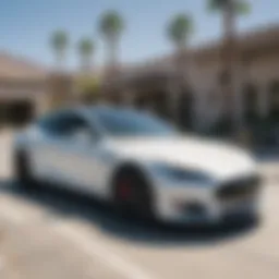 Sleek Tesla Model S parked in front of Palm Springs dealership