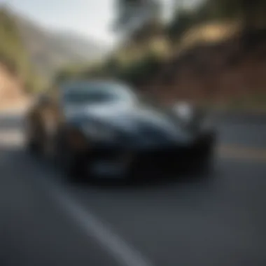 Sleek black sports car on winding road