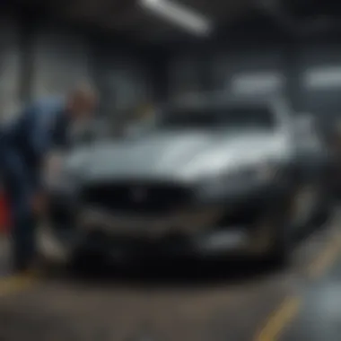Skilled technicians performing maintenance on a Jaguar Expert technicians working on a Jaguar vehicle
