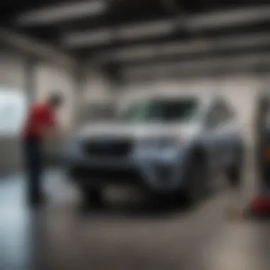 Technician performing maintenance on a Subaru Forester at a Washington DC dealership