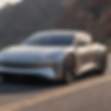 Lucid Air in motion on a scenic road during a test drive