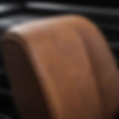 Demonstration of leather wrapping technique on a car seat