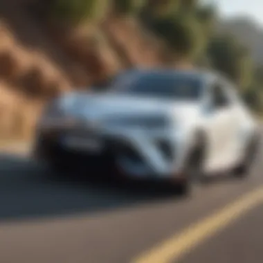 Toyota CH-R driving on a scenic road