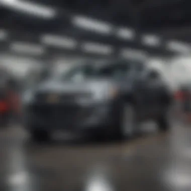 Service center at Vinita Chevy dealership with technicians at work.